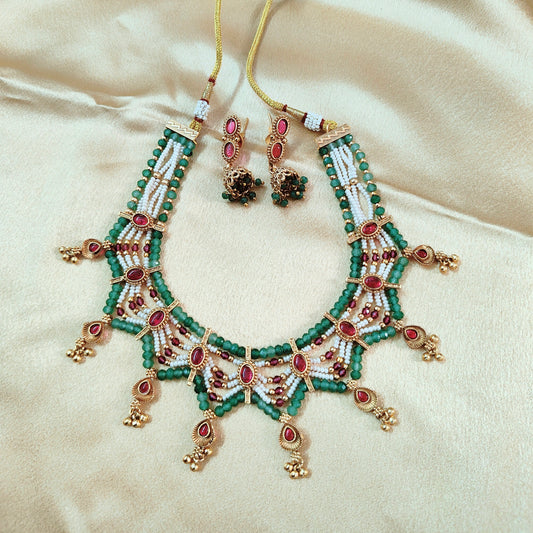 Exquisite Green Beaded Necklace Set with Red Stone Accents and Dangling Charms